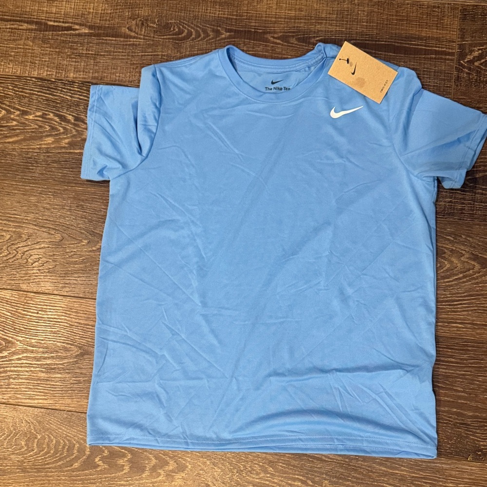 **DONATED** 
Nike women’s Light Blue Short Sleeve Tee